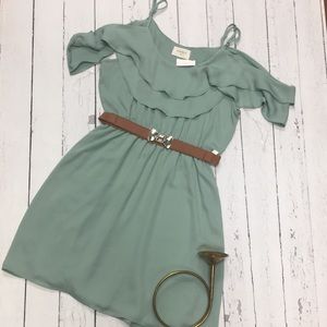 Pale green dress with brown leather belt